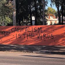 Capitalism is the virus, graffiti seen in Melbourne